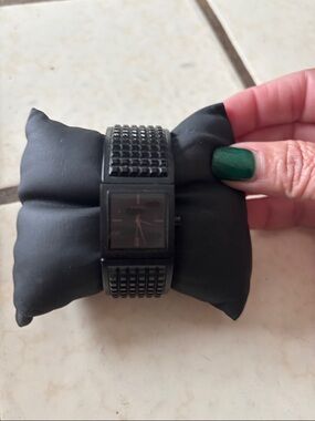 DKNY black studded women’s watch. Excellent used condition. Fully functional